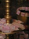 Real and ghost money offerings.